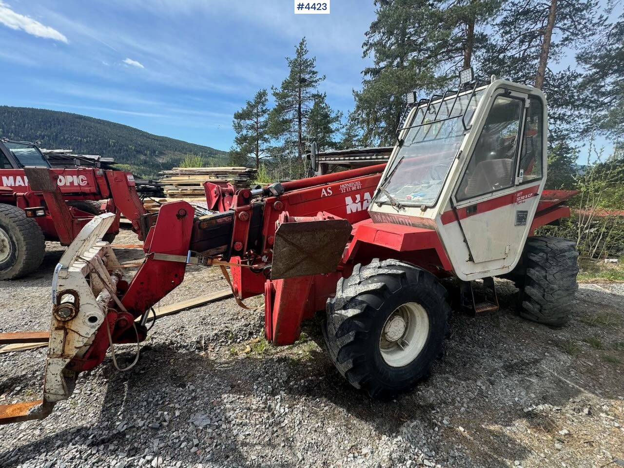 1992 Manitou MT1230 Telescopic forklift w/ pallet forks. Rep. object. - Gabelstapler: das Bild 4 1992 Manitou MT1230 Telescopic forklift w/ pallet forks. Rep. object. - Gabelstapler: das Bild 4