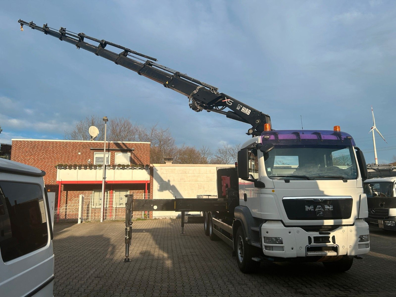 MAN 26.360 TGS Pritsche + HIAB 477 Kran 6x4 - Autokran: das Bild 4 MAN 26.360 TGS Pritsche + HIAB 477 Kran 6x4 - Autokran: das Bild 4