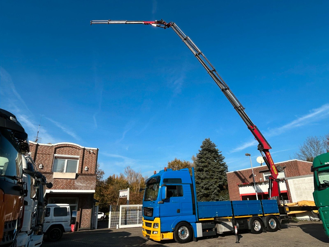 MAN 26.440 TGX Pritsche + PK 34002 + JIB Seilwinde - Autokran: das Bild 1 MAN 26.440 TGX Pritsche + PK 34002 + JIB Seilwinde - Autokran: das Bild 1
