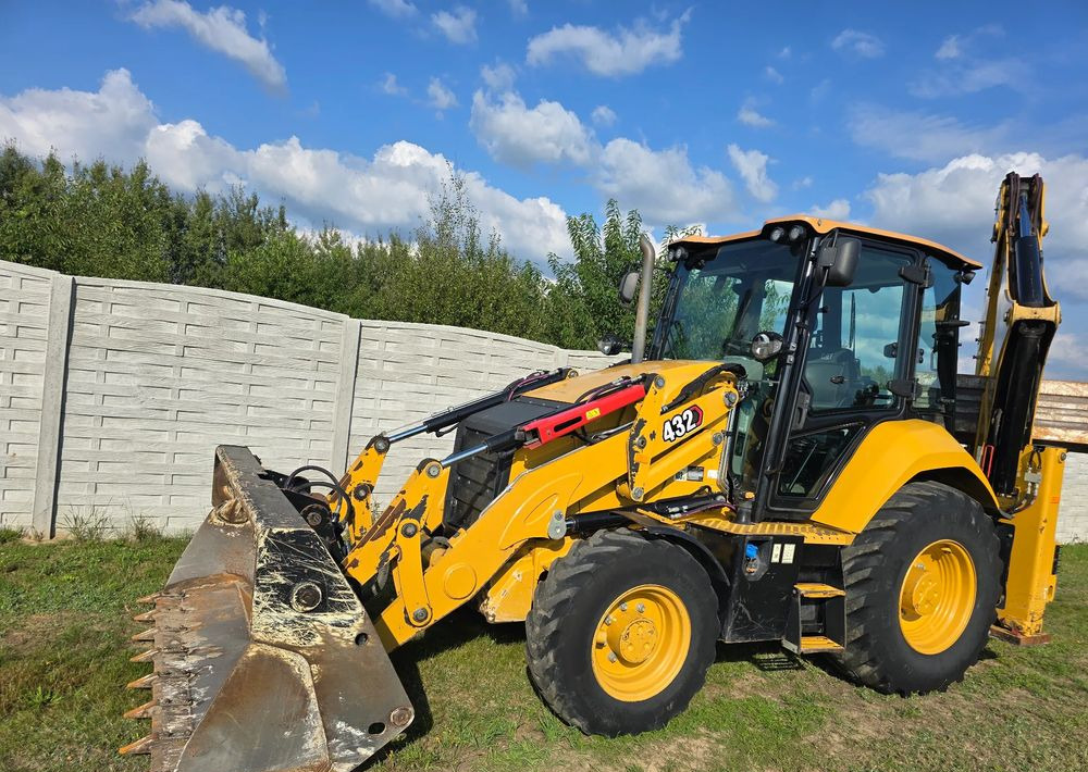 Caterpillar - Baggerlader: das Bild 1 Caterpillar - Baggerlader: das Bild 1