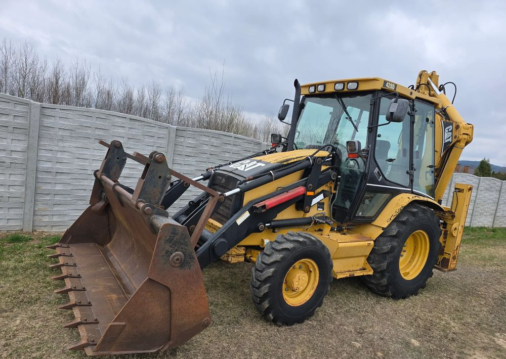 Caterpillar - Baggerlader: das Bild 1 Caterpillar - Baggerlader: das Bild 1