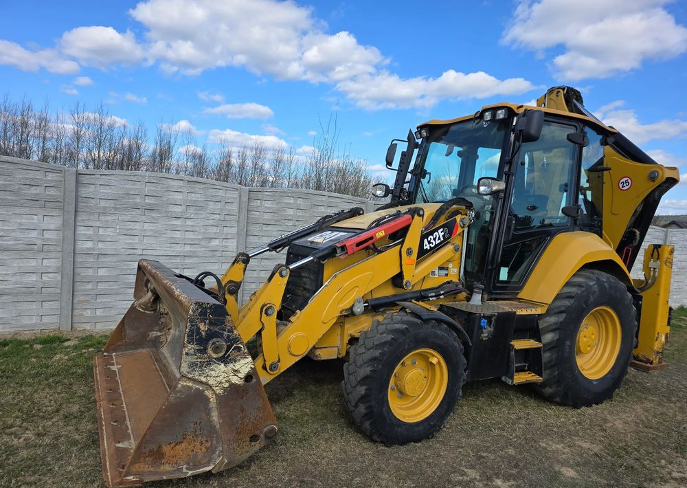 Caterpillar - Baggerlader: das Bild 1 Caterpillar - Baggerlader: das Bild 1