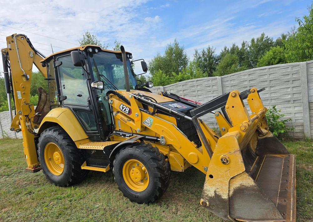 Caterpillar - Baggerlader: das Bild 1 Caterpillar - Baggerlader: das Bild 1