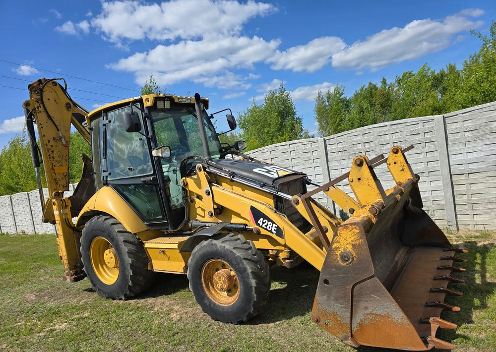 Caterpillar - Baggerlader: das Bild 1 Caterpillar - Baggerlader: das Bild 1