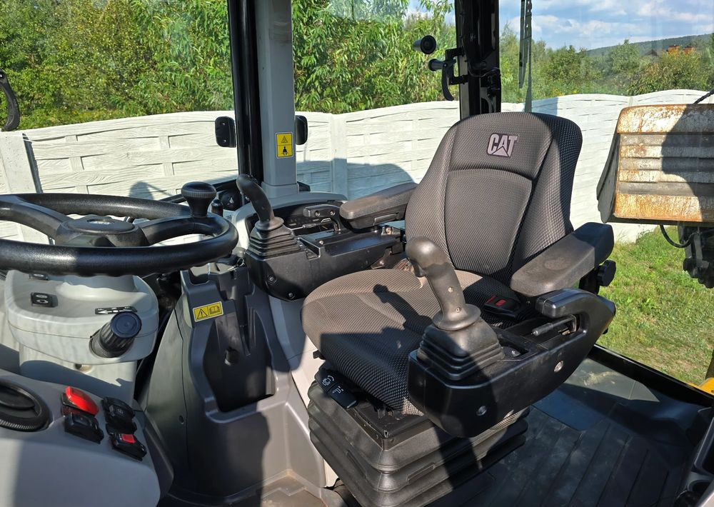 Caterpillar - Baggerlader: das Bild 3 Caterpillar - Baggerlader: das Bild 3