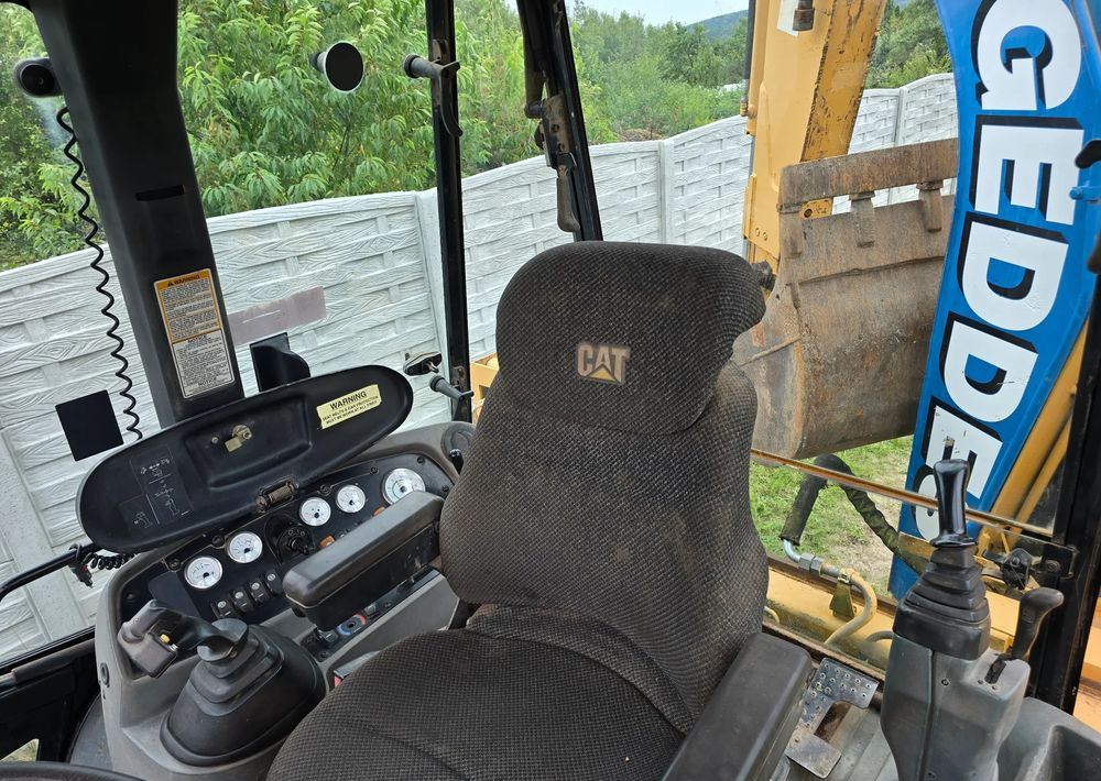 Caterpillar - Baggerlader: das Bild 3 Caterpillar - Baggerlader: das Bild 3