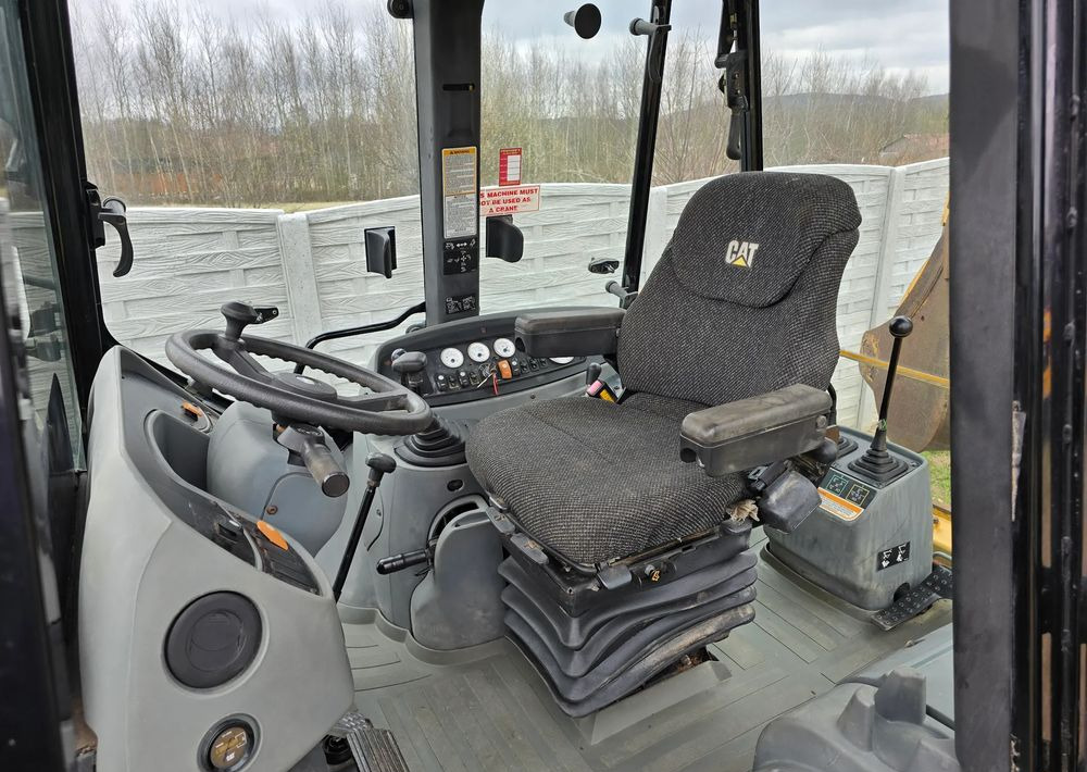 Caterpillar - Baggerlader: das Bild 2 Caterpillar - Baggerlader: das Bild 2