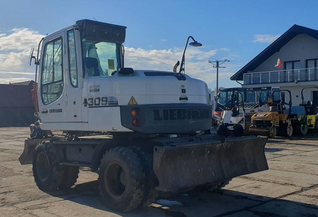 Liebherr A 309 Litronic - Mobilbagger: das Bild 2 Liebherr A 309 Litronic - Mobilbagger: das Bild 2