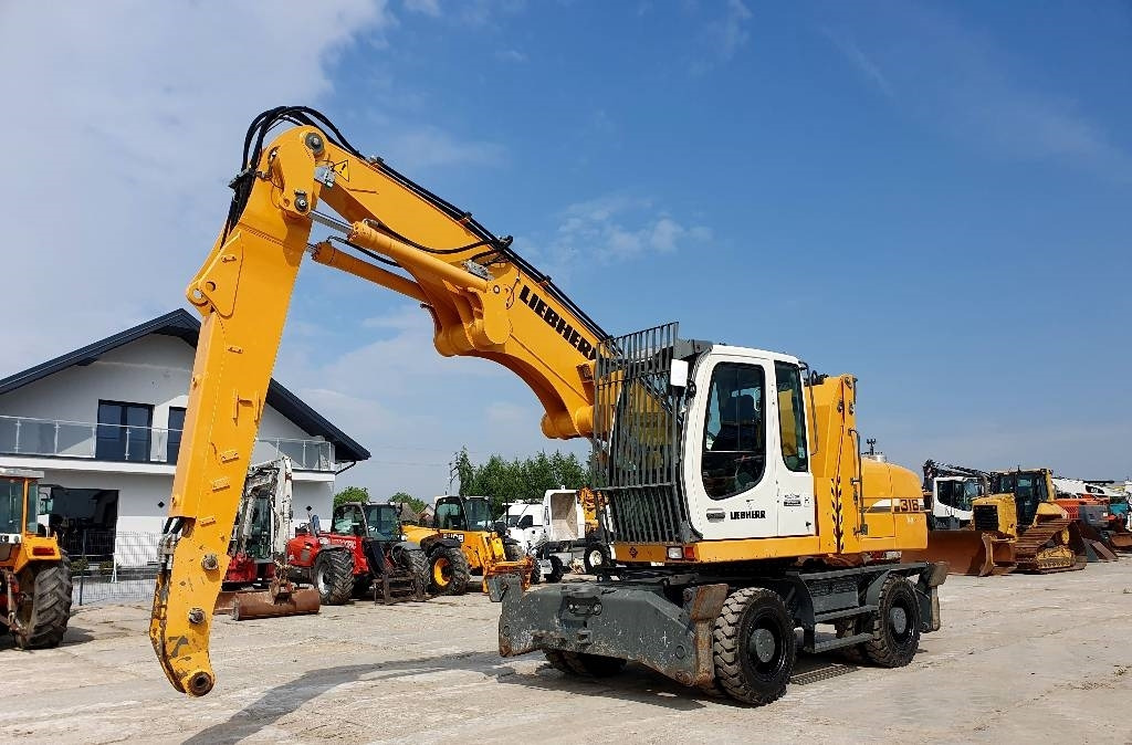 Liebherr A 316 Litronic - Umschlagbagger: das Bild 1 Liebherr A 316 Litronic - Umschlagbagger: das Bild 1