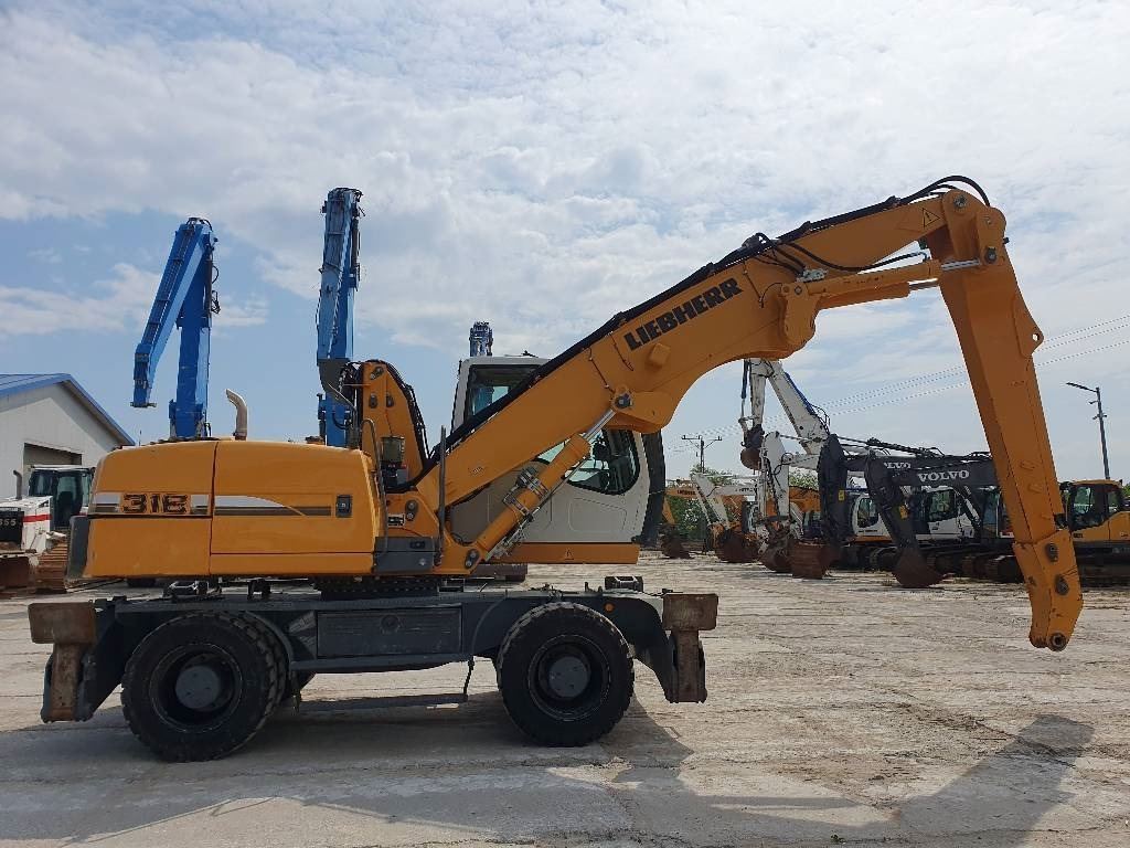 Liebherr A 316 Litronic - Umschlagbagger: das Bild 4 Liebherr A 316 Litronic - Umschlagbagger: das Bild 4