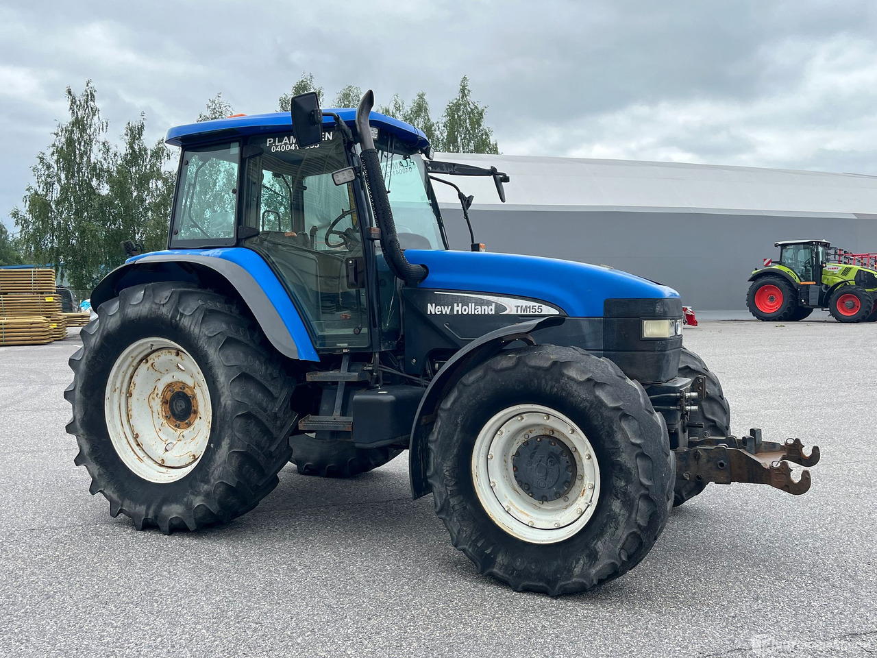 New Holland TM155, traktori etunostolaitteeella, 2004,, Salo - Landmaschine: das Bild 3 New Holland TM155, traktori etunostolaitteeella, 2004,, Salo - Landmaschine: das Bild 3