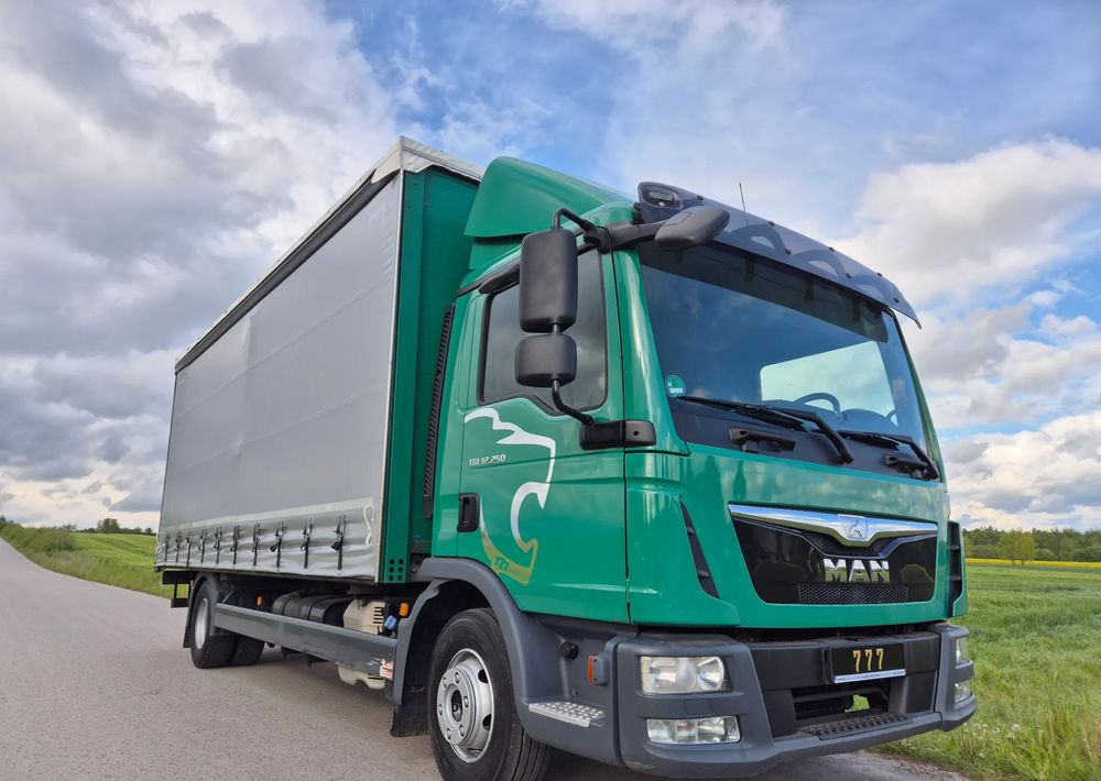 MAN TGL 12.250 6.2m AUTOMAT KLIMA z Niemiec ESP nowe opony EURO 6 / 4.75 rozstaw / zawiesie na wózek widłowy / TOP STAN / okazja nauka jazdy MOŻLIWOŚĆ DOSTOSOWANIA 12t - Plane LKW: das Bild 1 MAN TGL 12.250 6.2m AUTOMAT KLIMA z Niemiec ESP nowe opony EURO 6 / 4.75 rozstaw / zawiesie na wózek widłowy / TOP STAN / okazja nauka jazdy MOŻLIWOŚĆ DOSTOSOWANIA 12t - Plane LKW: das Bild 1