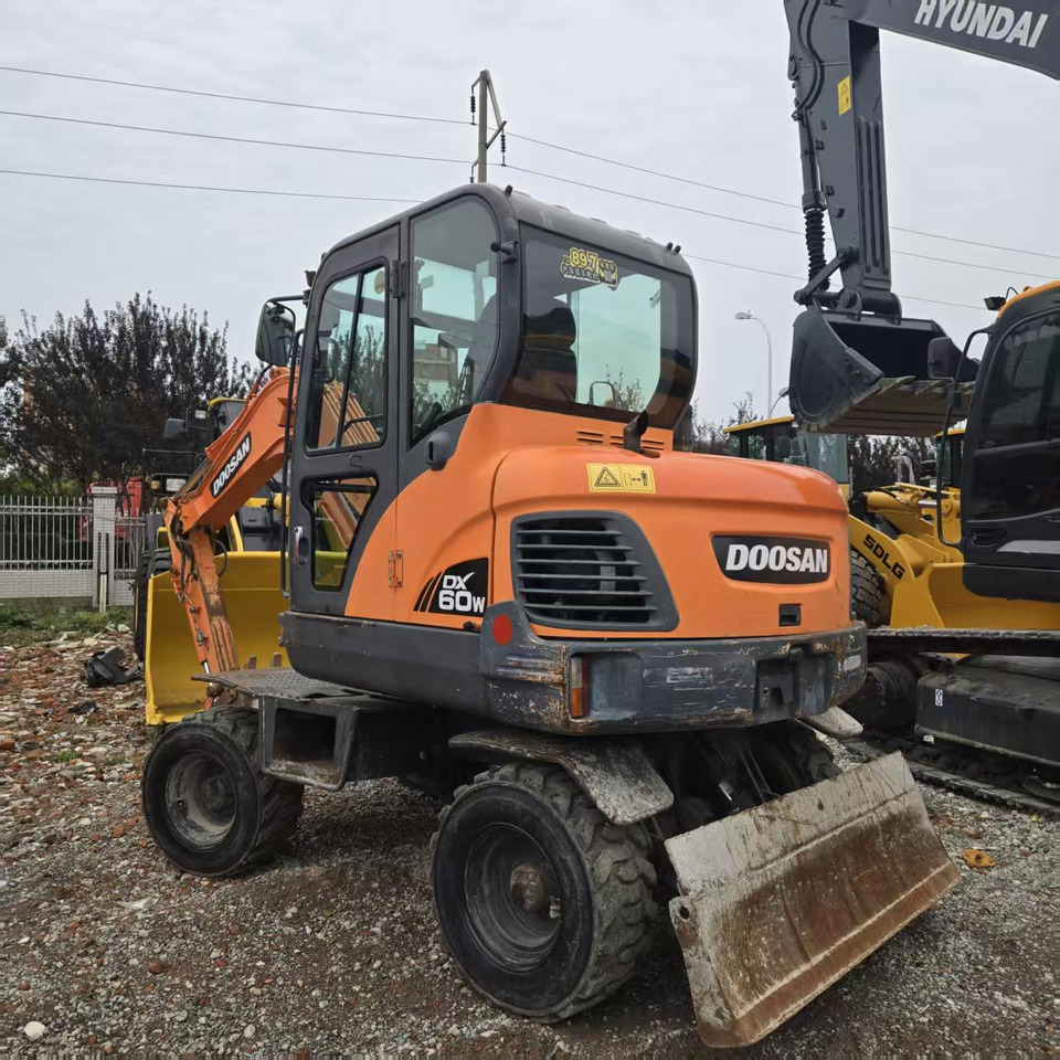 DOOSAN DX60W - Mobilbagger: das Bild 5 DOOSAN DX60W - Mobilbagger: das Bild 5