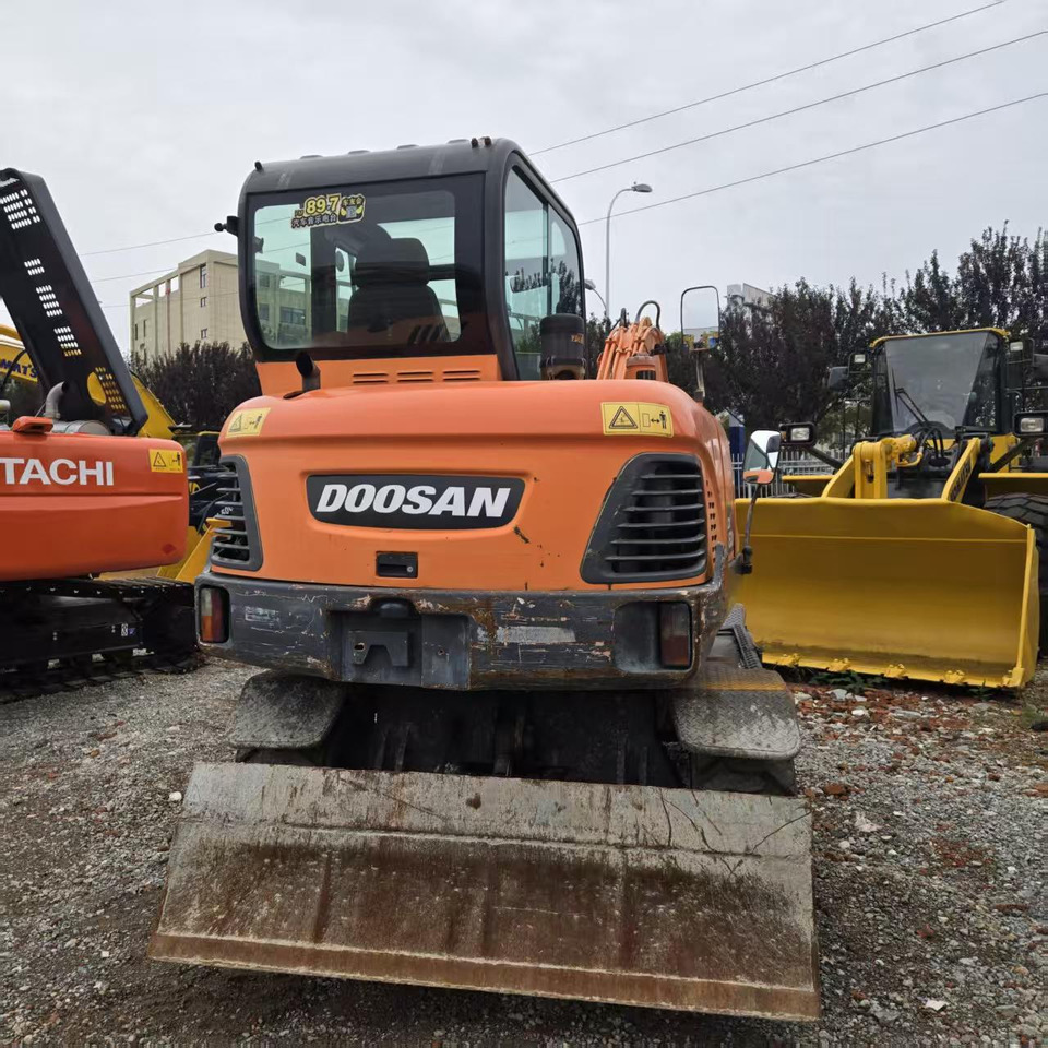 DOOSAN DX60W - Mobilbagger: das Bild 4 DOOSAN DX60W - Mobilbagger: das Bild 4