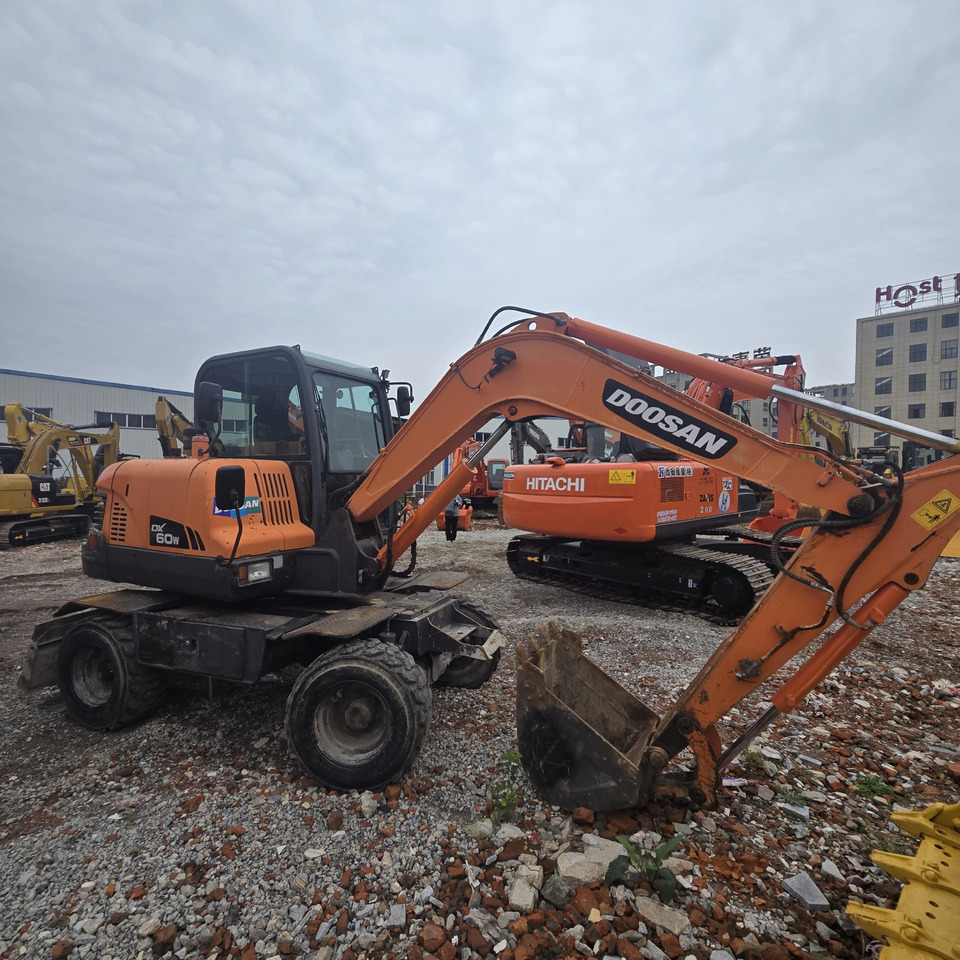 DOOSAN DX60W - Mobilbagger: das Bild 2 DOOSAN DX60W - Mobilbagger: das Bild 2