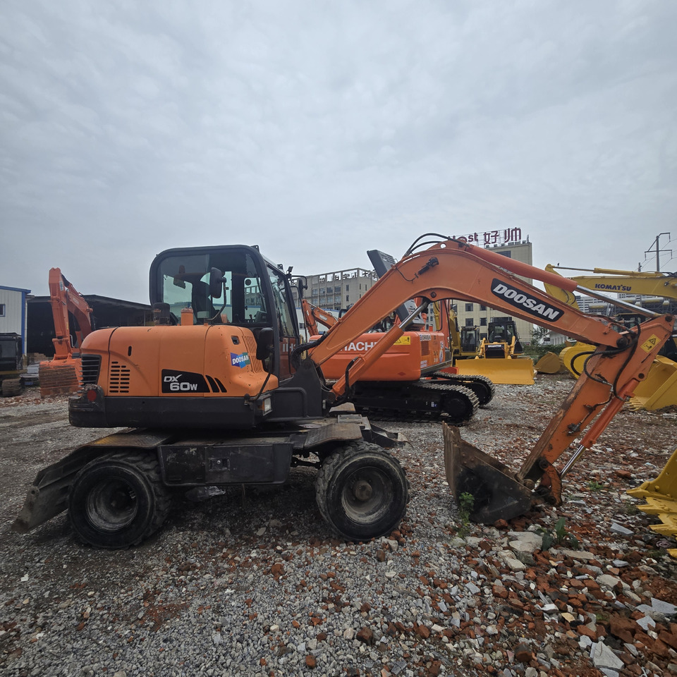DOOSAN DX60W - Mobilbagger: das Bild 1 DOOSAN DX60W - Mobilbagger: das Bild 1