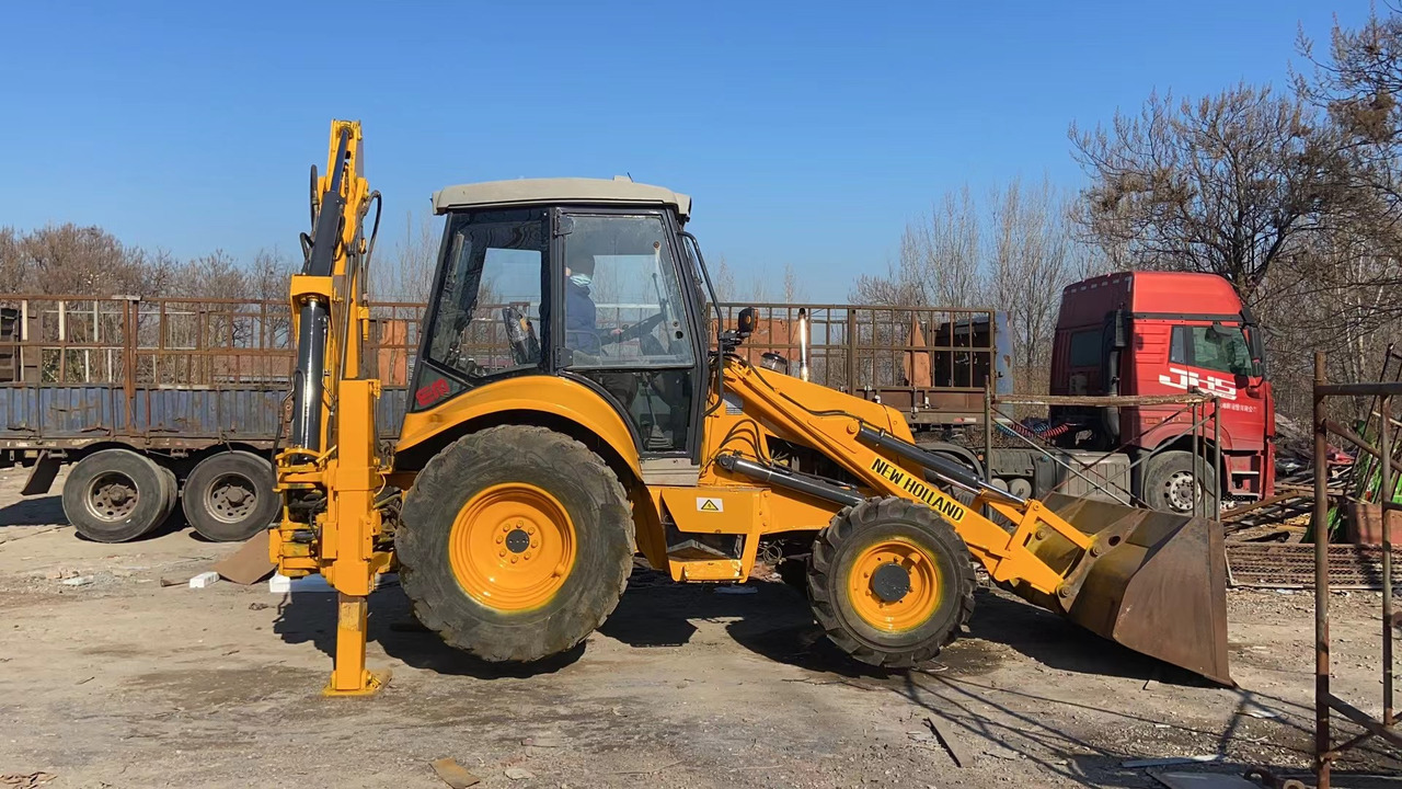 NEW HOLLAND LB95 - Baggerlader: das Bild 2 NEW HOLLAND LB95 - Baggerlader: das Bild 2