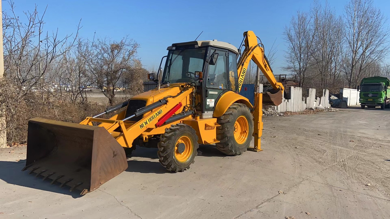 NEW HOLLAND LB95 - Baggerlader: das Bild 1 NEW HOLLAND LB95 - Baggerlader: das Bild 1