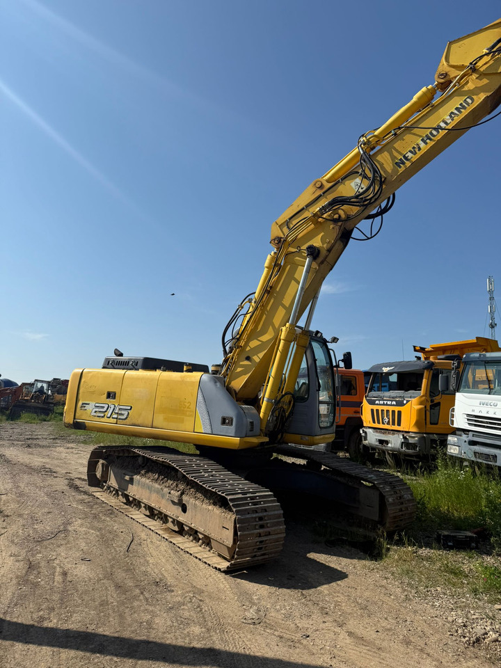 NEW HOLLAND E 215 EXCAVATOR - Kettenbagger: das Bild 4 NEW HOLLAND E 215 EXCAVATOR - Kettenbagger: das Bild 4