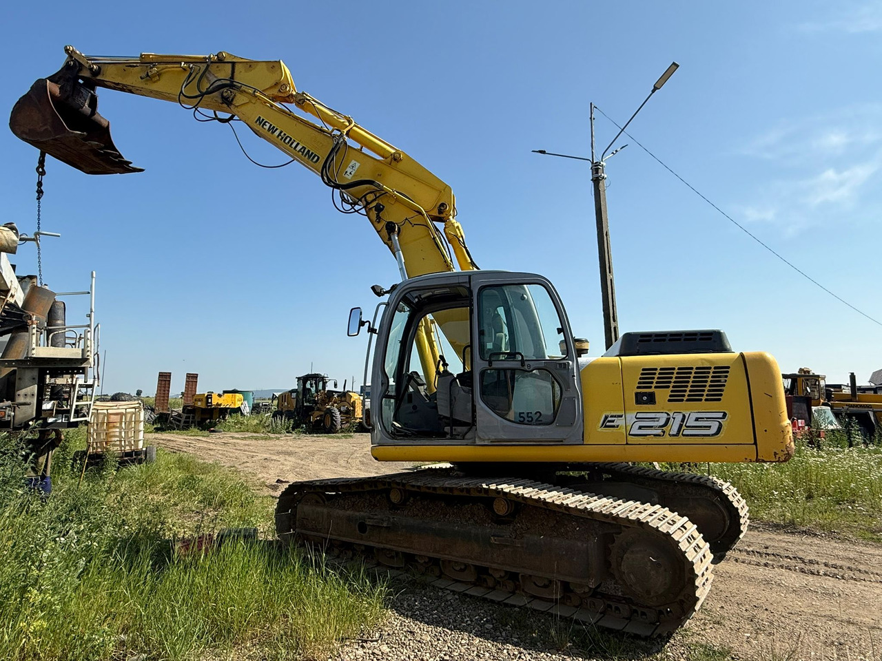 NEW HOLLAND E 215 EXCAVATOR - Kettenbagger: das Bild 2 NEW HOLLAND E 215 EXCAVATOR - Kettenbagger: das Bild 2