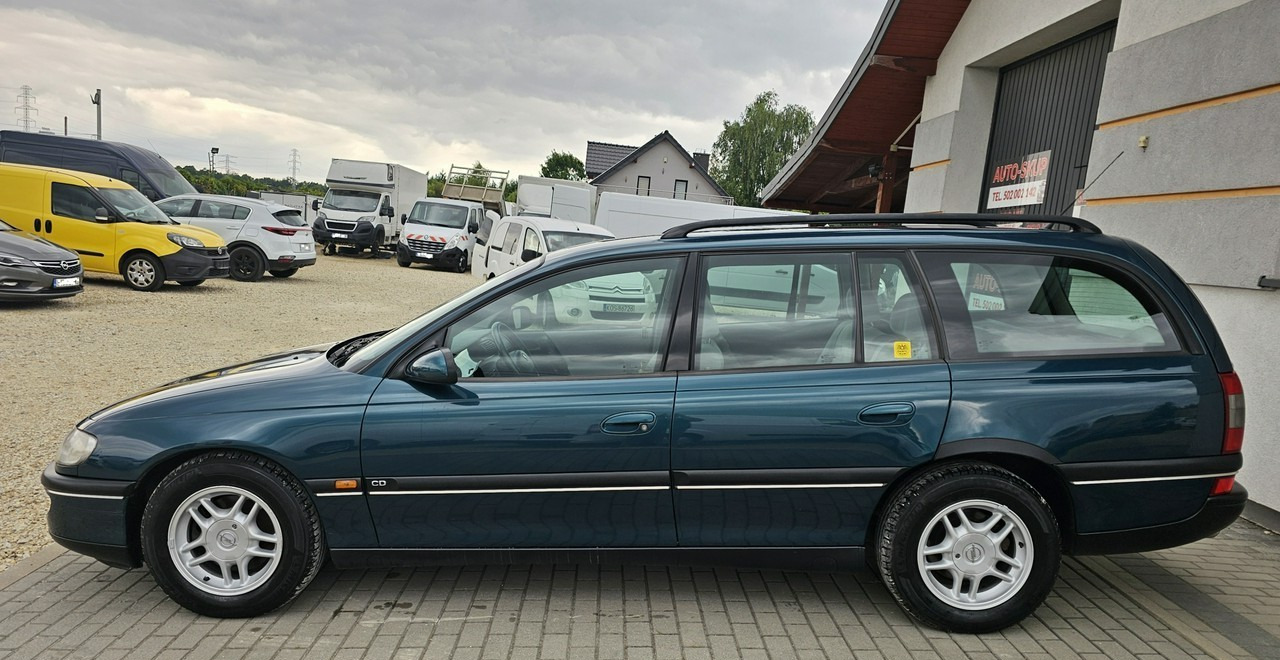 Opel Omega B 2,5 v6 *automat* napęd tył *welury* - PKW: das Bild 4 Opel Omega B 2,5 v6 *automat* napęd tył *welury* - PKW: das Bild 4