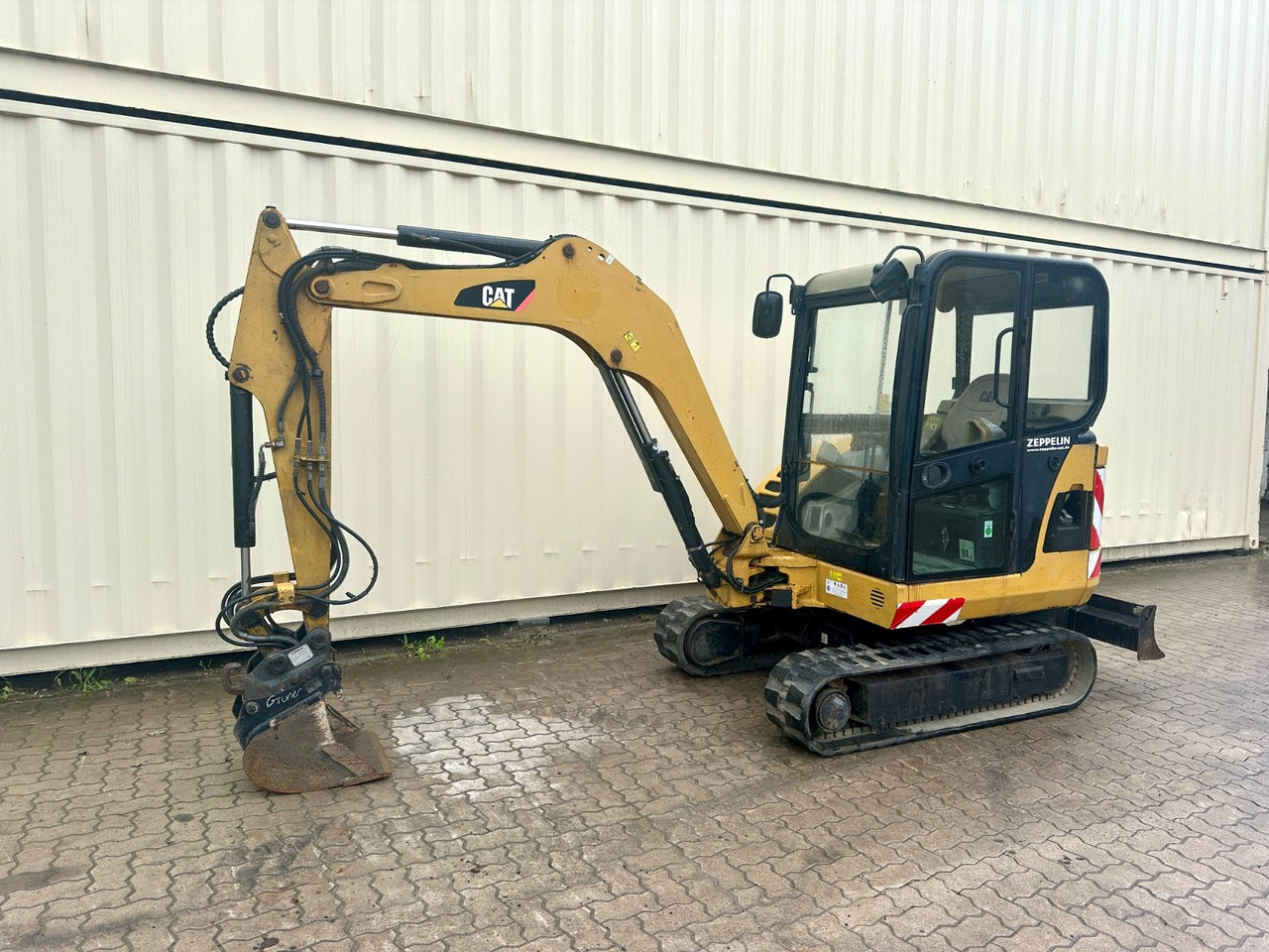 CAT 302.5C / OilQuick OQ40 / Deutsche Maschine - Minibagger: das Bild 2 CAT 302.5C / OilQuick OQ40 / Deutsche Maschine - Minibagger: das Bild 2