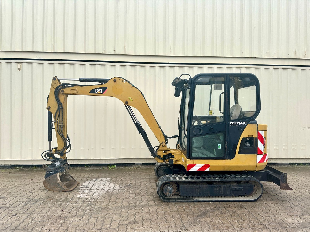 CAT 302.5C / OilQuick OQ40 / Deutsche Maschine - Minibagger: das Bild 1 CAT 302.5C / OilQuick OQ40 / Deutsche Maschine - Minibagger: das Bild 1