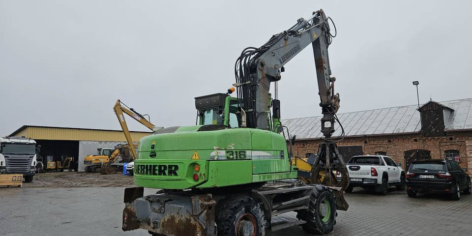 Koparka kołowa Liebherr A 316 Litronic chwytak podpory pług - Mobilbagger: das Bild 5 Koparka kołowa Liebherr A 316 Litronic chwytak podpory pług - Mobilbagger: das Bild 5