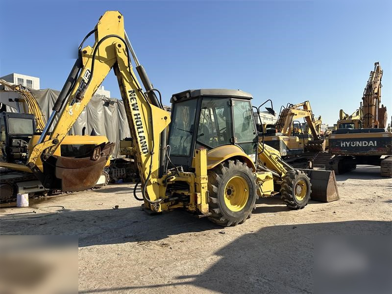 NEW HOLLAND LB95B-4PT - Baggerlader: das Bild 1 NEW HOLLAND LB95B-4PT - Baggerlader: das Bild 1