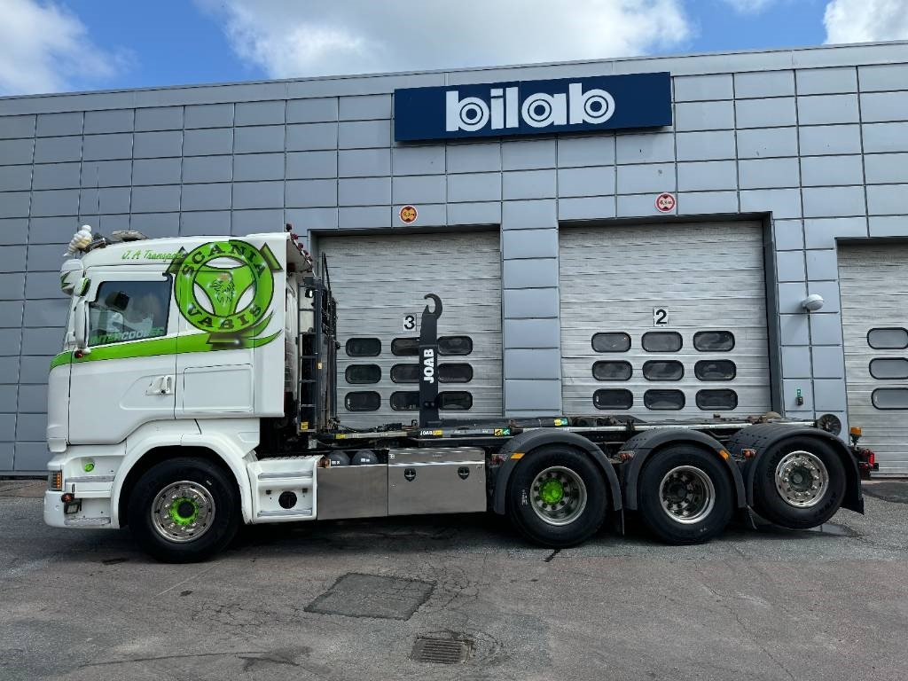 Scania R 520 LB8x4*4 - Abrollkipper: das Bild 1 Scania R 520 LB8x4*4 - Abrollkipper: das Bild 1