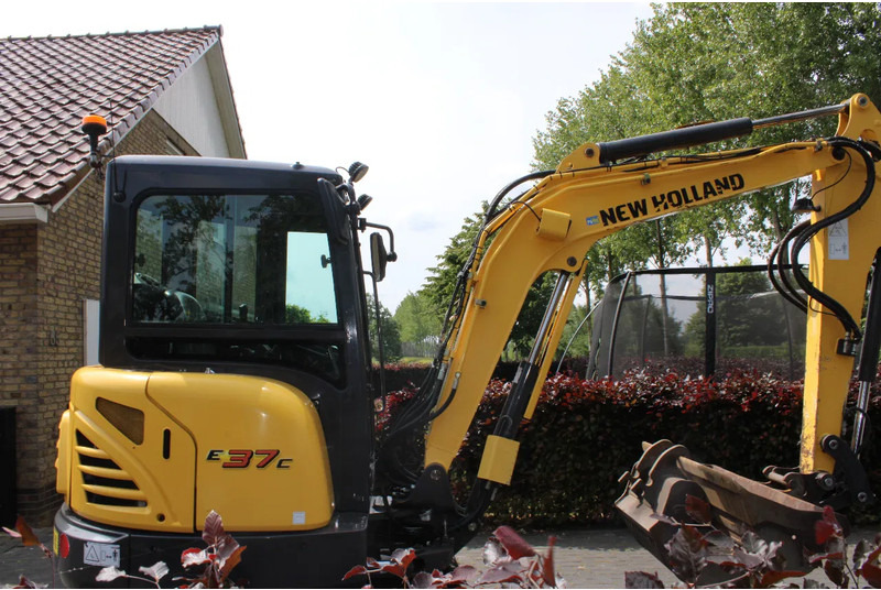 New Holland E37C binnendraaier - Minikran: das Bild 3 New Holland E37C binnendraaier - Minikran: das Bild 3