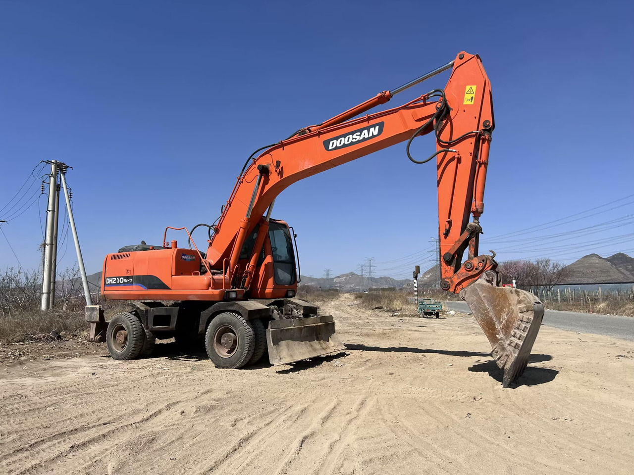 DOOSAN 210w-7 - Mobilbagger: das Bild 2 DOOSAN 210w-7 - Mobilbagger: das Bild 2