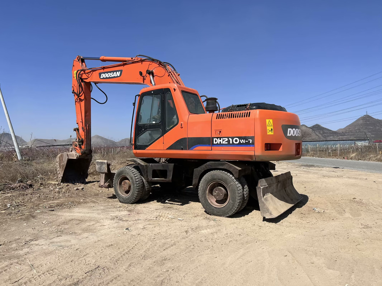 DOOSAN 210w - Mobilbagger: das Bild 1 DOOSAN 210w - Mobilbagger: das Bild 1