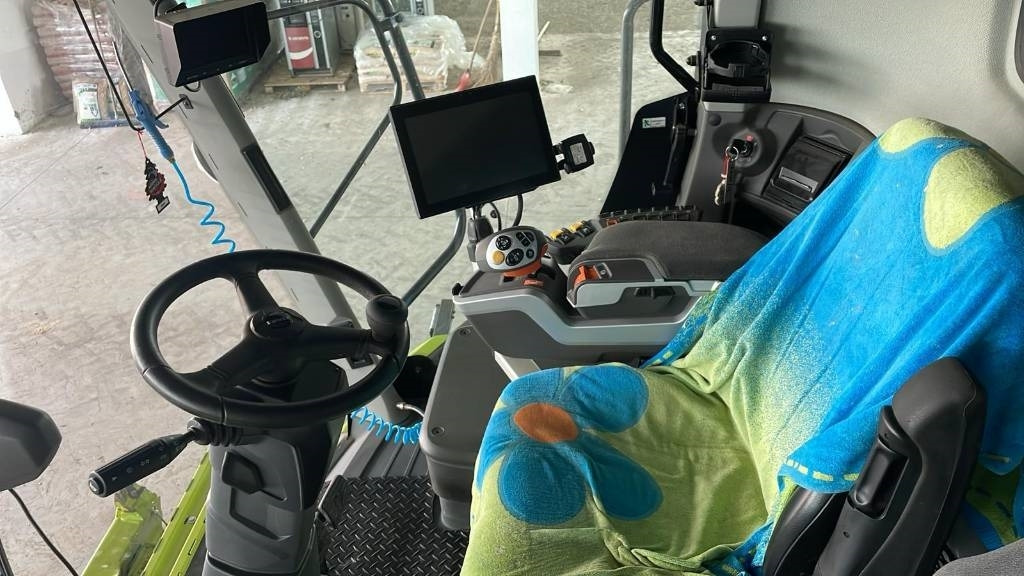 Claas LEXION 7700 TT - Mähdrescher: das Bild 3 Claas LEXION 7700 TT - Mähdrescher: das Bild 3