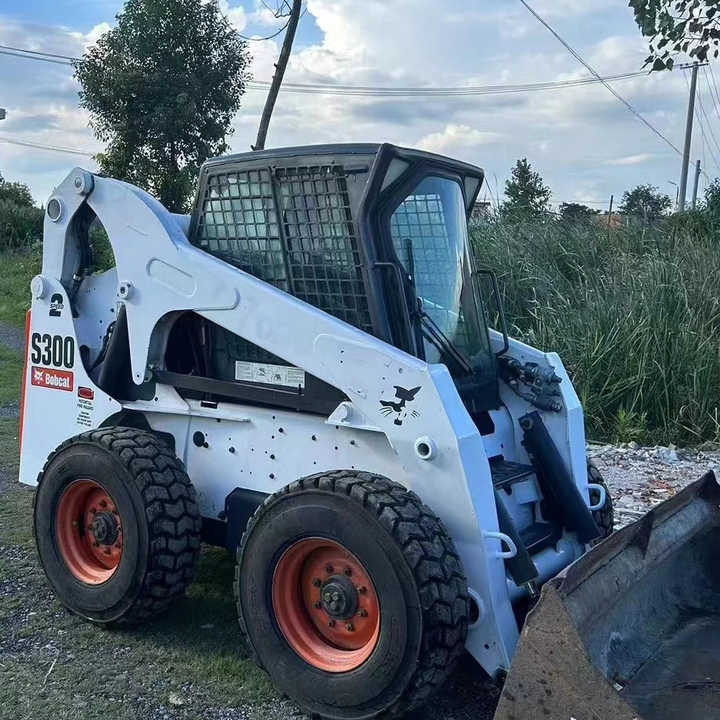 Used Bob Cat Bob Cat S300 Used Mini Skid Steer Wheel Loader Multifunctional Track Loaders Bobcat S300 - Radlader: das Bild 1 Used Bob Cat Bob Cat S300 Used Mini Skid Steer Wheel Loader Multifunctional Track Loaders Bobcat S300 - Radlader: das Bild 1