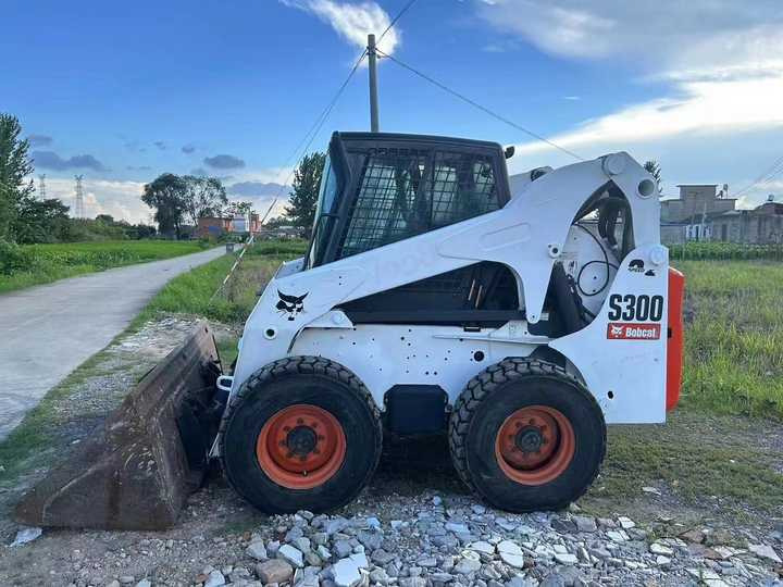 Used Bob Cat Bob Cat S300 Used Mini Skid Steer Wheel Loader Multifunctional Track Loaders Bobcat S300 - Radlader: das Bild 4 Used Bob Cat Bob Cat S300 Used Mini Skid Steer Wheel Loader Multifunctional Track Loaders Bobcat S300 - Radlader: das Bild 4