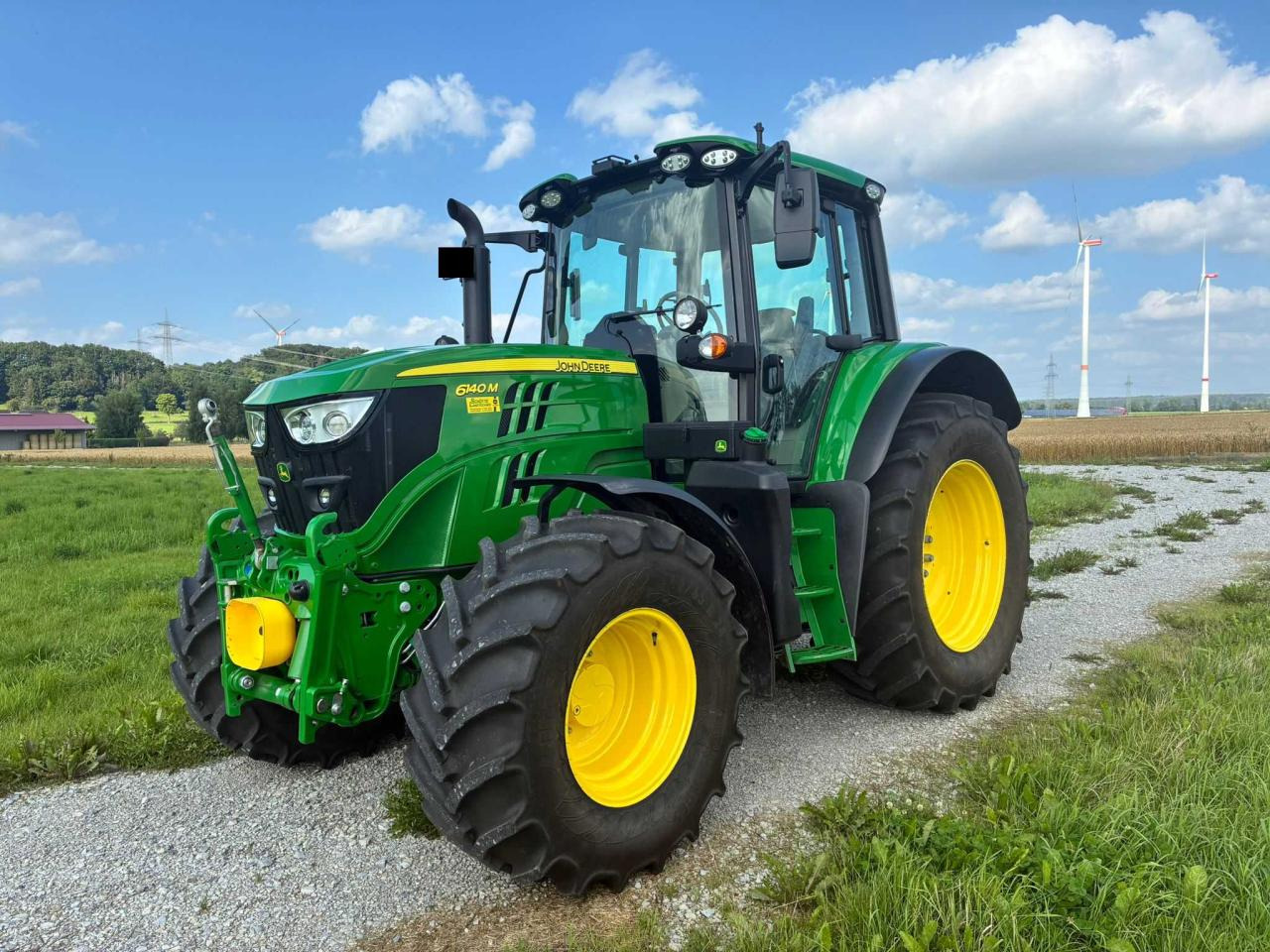 John Deere 6140M - Traktor: das Bild 1 John Deere 6140M - Traktor: das Bild 1