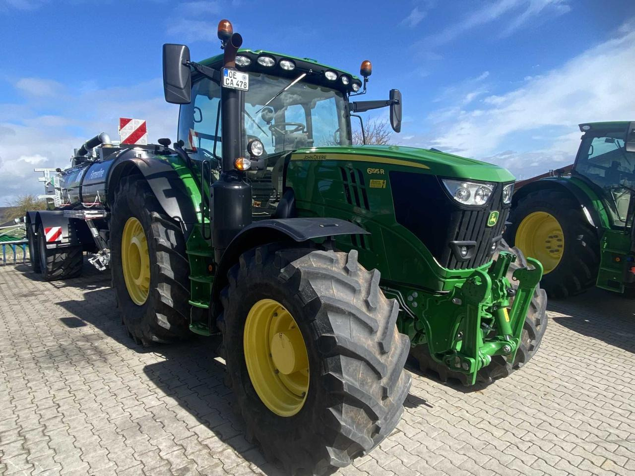 John Deere 6195R - Traktor: das Bild 4 John Deere 6195R - Traktor: das Bild 4