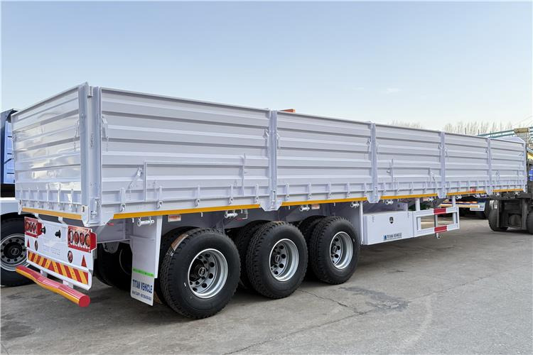 TITAN 2025 New 60 Ton Dropside Wall Trailer for Sale In Zimbabwe - Pritschenauflieger/ Plattformauflieger: das Bild 2 TITAN 2025 New 60 Ton Dropside Wall Trailer for Sale In Zimbabwe - Pritschenauflieger/ Plattformauflieger: das Bild 2