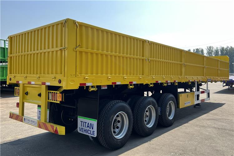 TITAN Triple Axle Trailer with Drop Side Trailer for Sale In Ghana - Pritschenauflieger/ Plattformauflieger: das Bild 3 TITAN Triple Axle Trailer with Drop Side Trailer for Sale In Ghana - Pritschenauflieger/ Plattformauflieger: das Bild 3