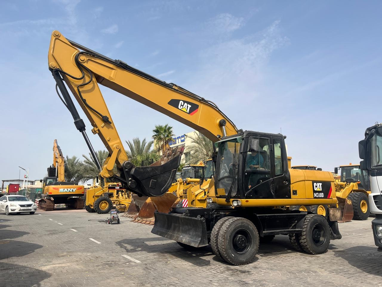 CATERPILLAR M318D - Mobilbagger: das Bild 1 CATERPILLAR M318D - Mobilbagger: das Bild 1