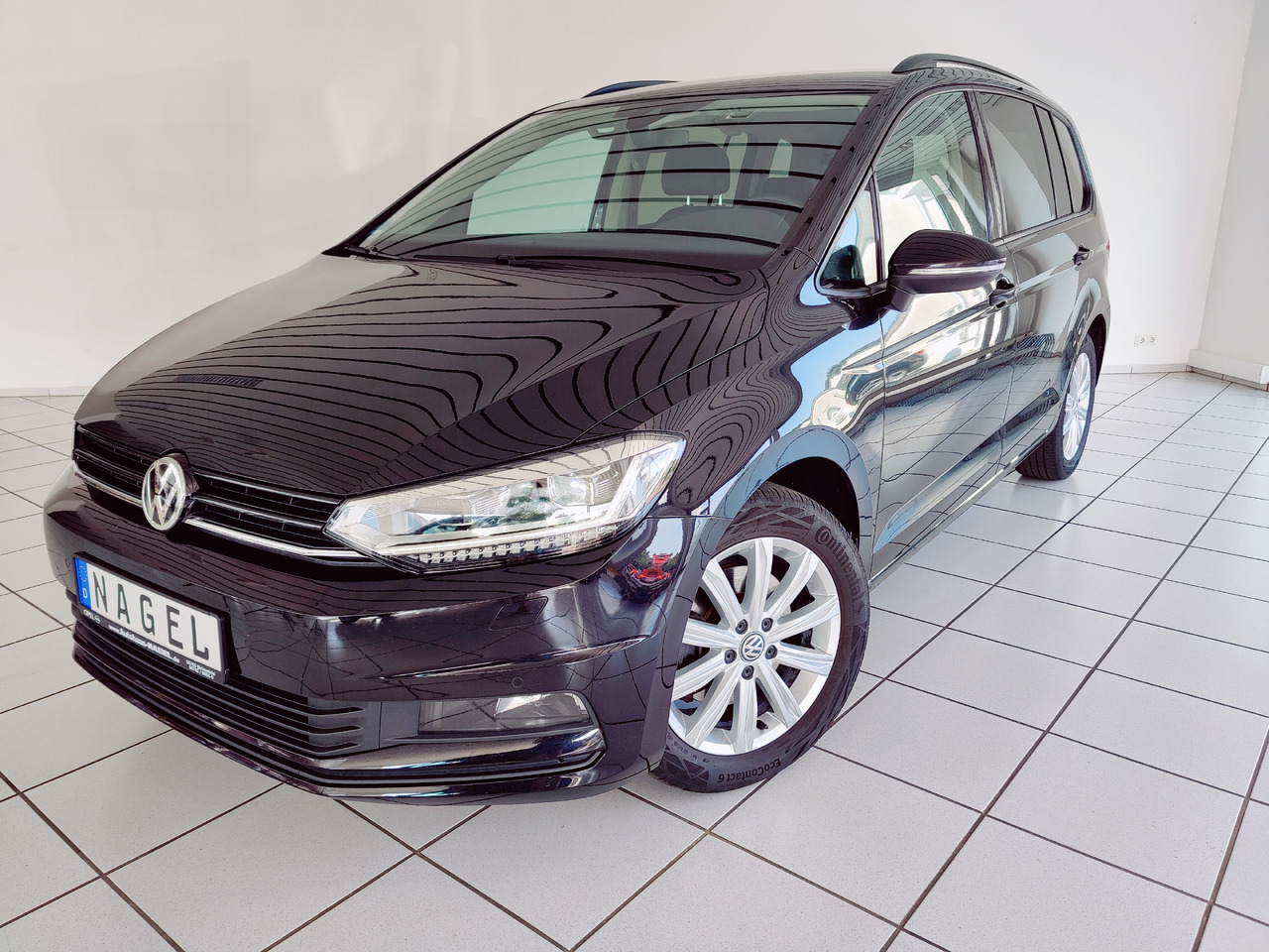 Volkswagen Touran Highline BMT/Start-Stopp Navi Licht RüKam - PKW: das Bild 1 Volkswagen Touran Highline BMT/Start-Stopp Navi Licht RüKam - PKW: das Bild 1