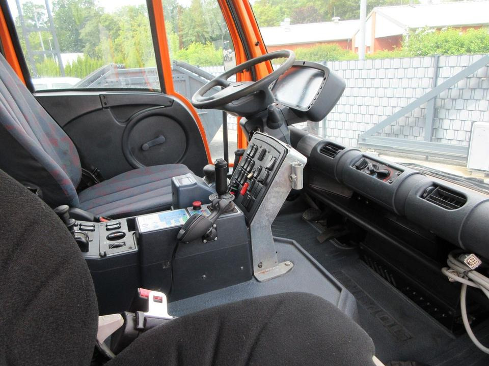 Kipper Unimog U 400, DSK., Langer Radstand, Klima: das Bild 9
