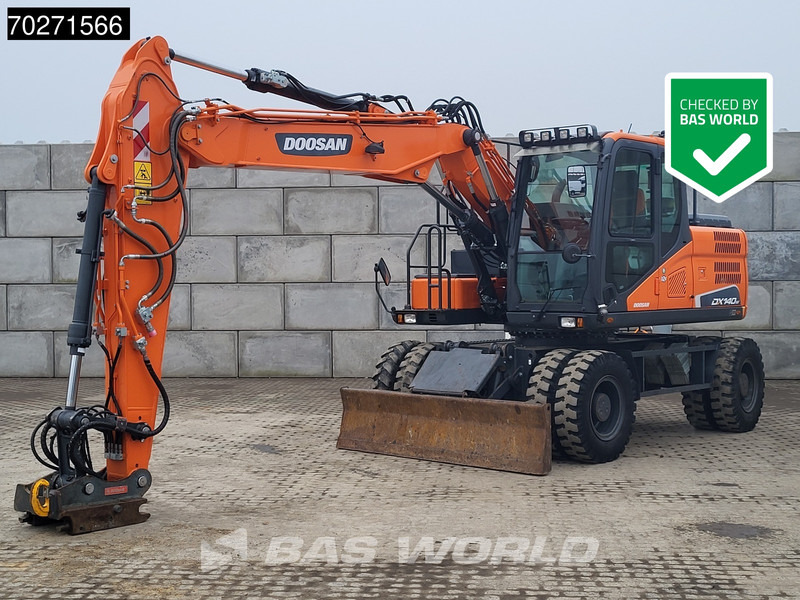 Doosan DX140 W-5 OIL QUICK - GERMAN - Mobilbagger: das Bild 1 Doosan DX140 W-5 OIL QUICK - GERMAN - Mobilbagger: das Bild 1