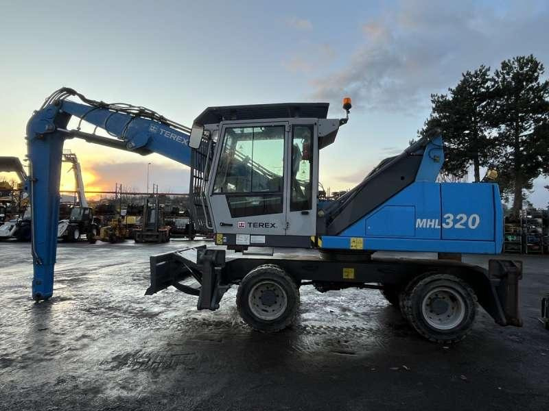 Fuchs MHL320 - Umschlagbagger: das Bild 5 Fuchs MHL320 - Umschlagbagger: das Bild 5