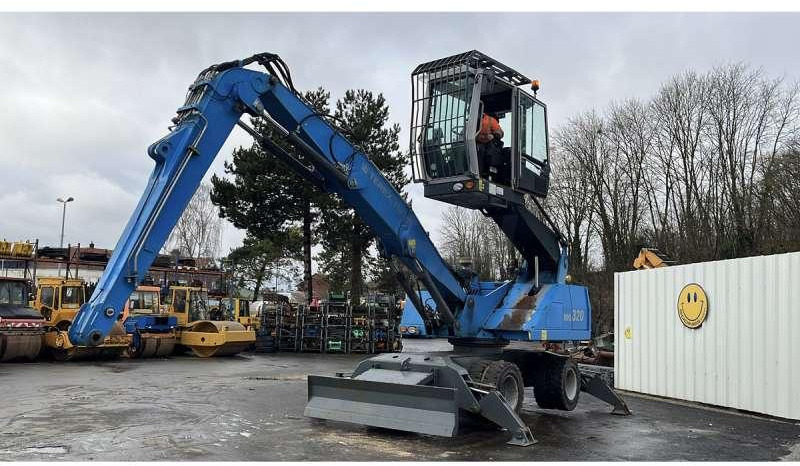 Fuchs MHL320 - Umschlagbagger: das Bild 1 Fuchs MHL320 - Umschlagbagger: das Bild 1