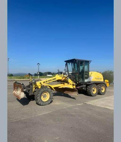 New Holland F106.6A 6X6 MACHINE SUISSE - Grader: das Bild 4 New Holland F106.6A 6X6 MACHINE SUISSE - Grader: das Bild 4