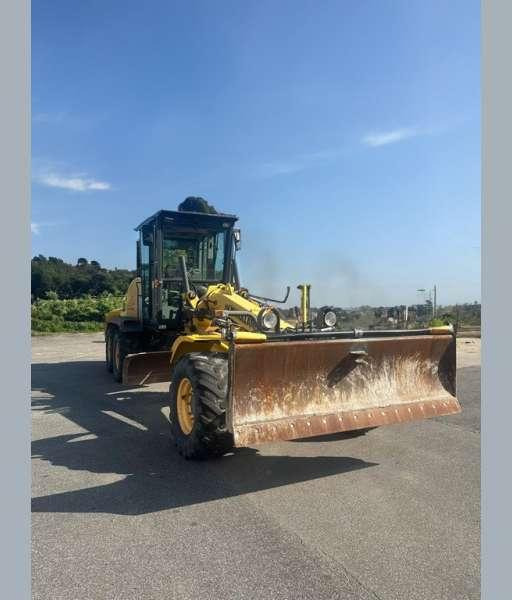 New Holland F106.6A 6X6 MACHINE SUISSE - Grader: das Bild 3 New Holland F106.6A 6X6 MACHINE SUISSE - Grader: das Bild 3