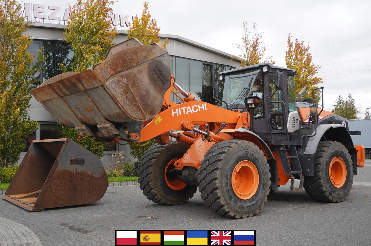 HITACHI ZW220 articulated loader / 2 buckets - Radlader: das Bild 1 HITACHI ZW220 articulated loader / 2 buckets - Radlader: das Bild 1