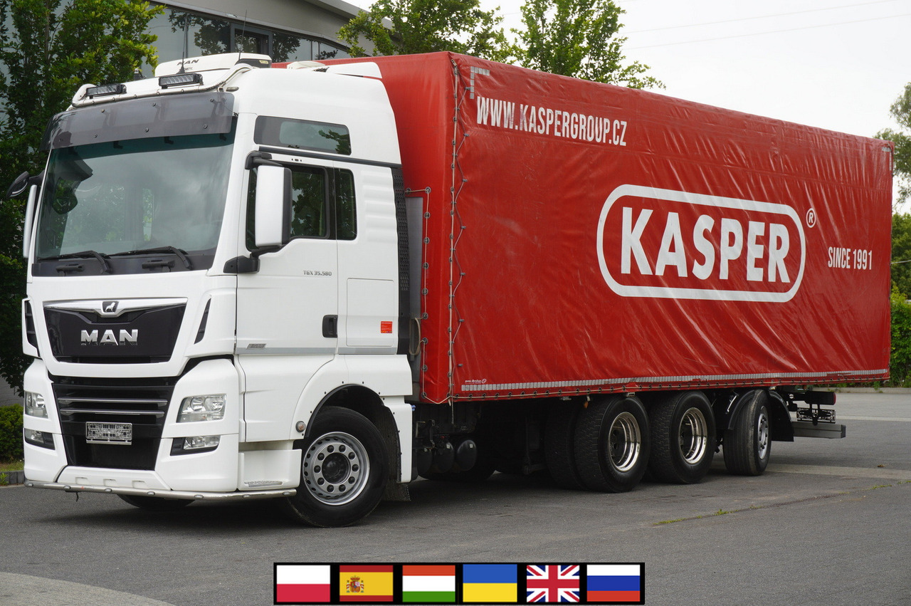 MAN MAN TGX 35.580 E6 8x4 /4 / 23 EPAL tarp superstructure / 4th axle steered - Plane LKW: das Bild 1 MAN MAN TGX 35.580 E6 8x4 /4 / 23 EPAL tarp superstructure / 4th axle steered - Plane LKW: das Bild 1